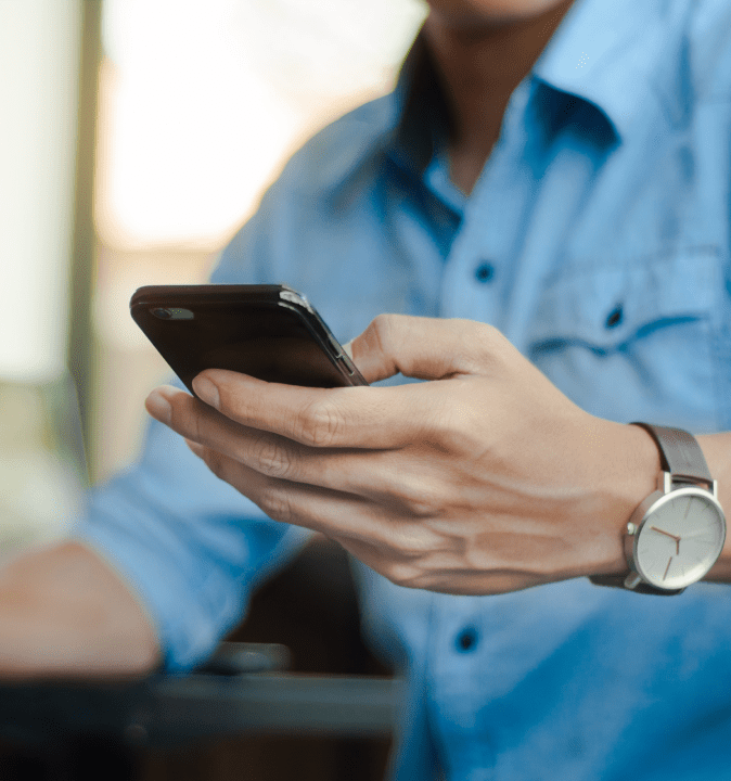 A closeup of a person holding a cell phone