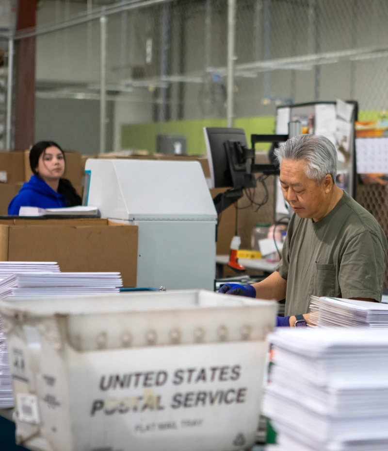 People working in a post office